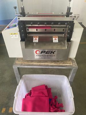 Tipo di taglio Operatore automatico Macchina di taglio di tessuti a maglia per cappelli a nastro 0,9 Kw