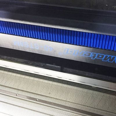 Macchina da maglieria a colletto piatto a tre sistemi a carrello singolo per magliere Jacquard da 80 pollici